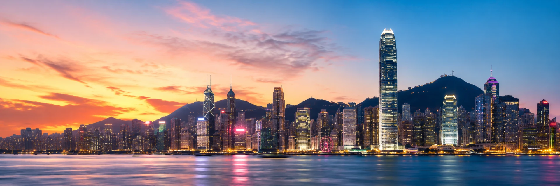 Hong Kong skyline at sunset viewed from Victoria Harbour