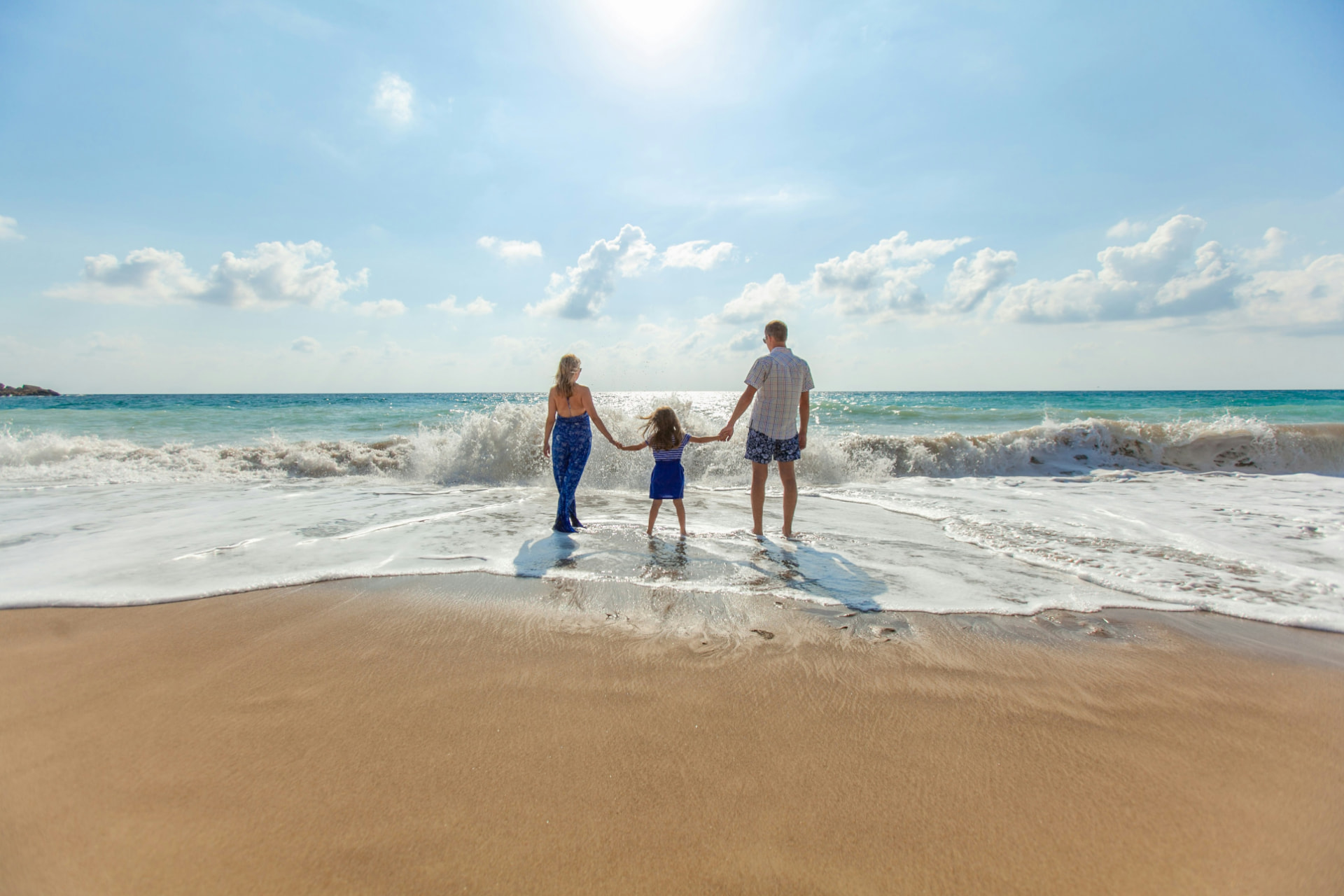 A family standing together at the shoreline — Generali Hong Kong × Wonder case study