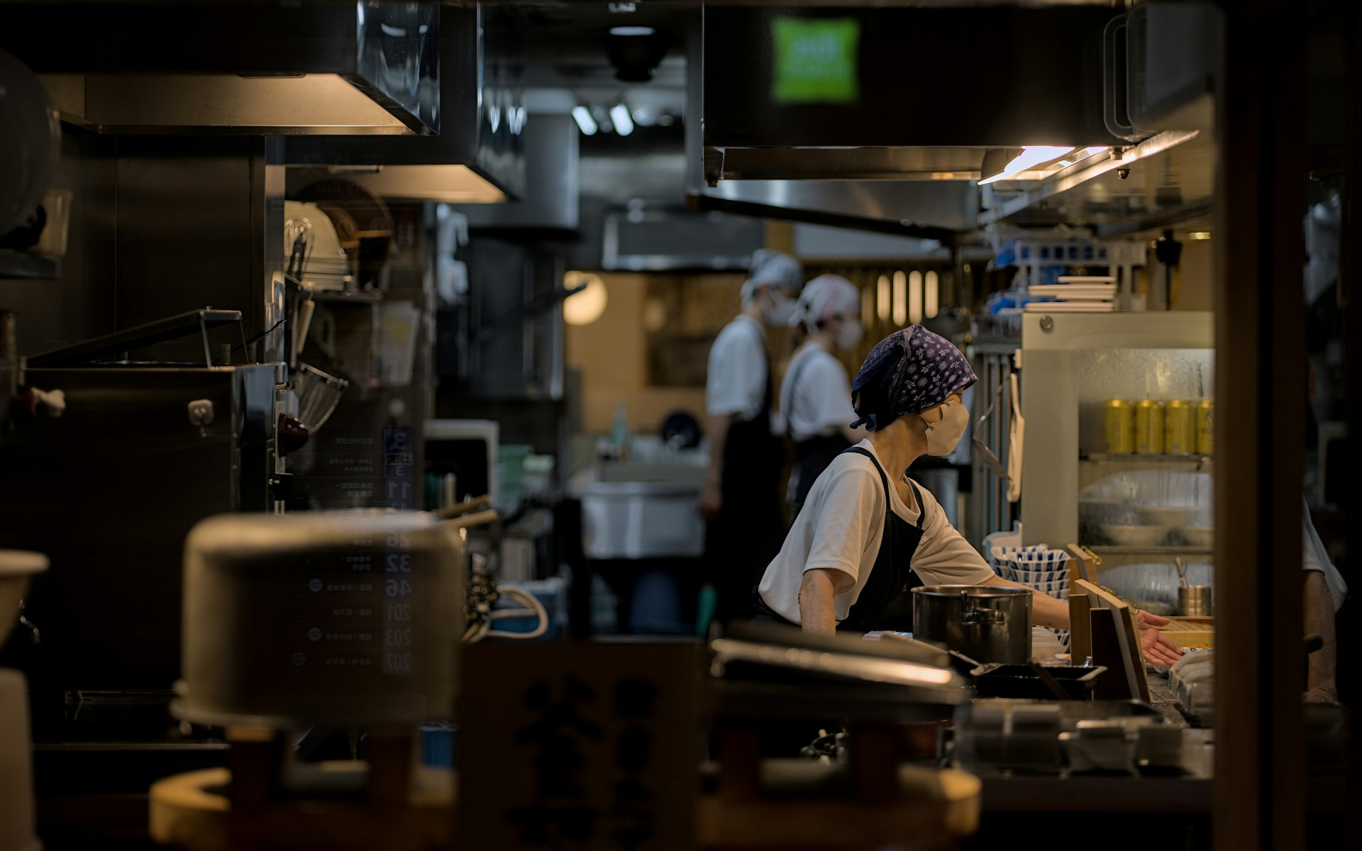Restaurant kitchen team preparing service